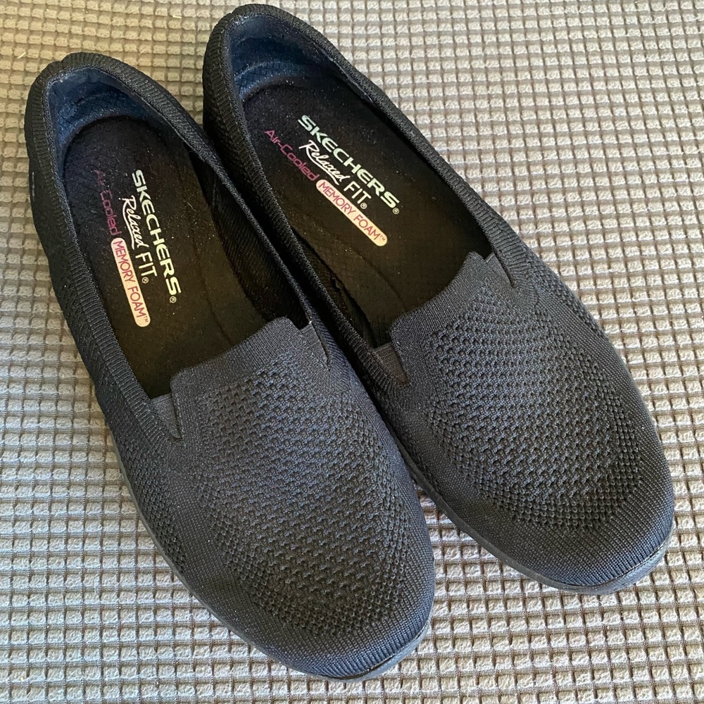 Sketchers Black Slip-Ons